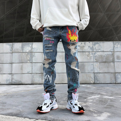 Graffiti print ripped jeans - Plushlegacy